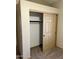 Spacious bedroom closet offers plenty of storage with shelving and sliding doors at 9109 W Watson Ln, Peoria, AZ 85381