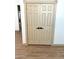 Close-up of the closet doors with wood-look flooring at 9109 W Watson Ln, Peoria, AZ 85381
