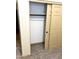 View of an organized closet with built-in shelving and sliding doors at 9109 W Watson Ln, Peoria, AZ 85381