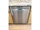 Sleek stainless steel dishwasher seamlessly integrated into the kitchen cabinetry at 9109 W Watson Ln, Peoria, AZ 85381