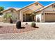 Charming single-story home with desert landscaping, a two-car garage, and a welcoming front entrance at 9109 W Watson Ln, Peoria, AZ 85381
