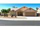 Charming single-story home with desert landscaping, a two-car garage, and a welcoming front entrance at 9109 W Watson Ln, Peoria, AZ 85381