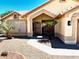 Inviting front porch with desert landscaping and a clear view of the home's entrance at 9109 W Watson Ln, Peoria, AZ 85381