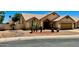 Single-story home with well-manicured desert landscaping and an attached two-car garage at 9109 W Watson Ln, Peoria, AZ 85381