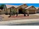 Well-kept single-story home featuring desert landscaping with cacti and an attached garage at 9109 W Watson Ln, Peoria, AZ 85381
