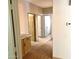 A hallway with a cabinet and doors at 9109 W Watson Ln, Peoria, AZ 85381
