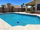 Cool off in this sparkling pool, the centerpiece of a backyard designed for relaxation and enjoyment at 9109 W Watson Ln, Peoria, AZ 85381