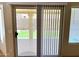 Sliding glass doors let natural light into the home while offering access to the backyard at 9109 W Watson Ln, Peoria, AZ 85381