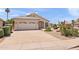 Well-kept home with a two-car garage and desert landscaping in a quiet neighborhood at 9239 E Karen Dr, Scottsdale, AZ 85260