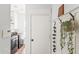 Mud Room featuring modern washer/dryer, wainscoting, and accent pieces at 9239 E Karen Dr, Scottsdale, AZ 85260