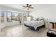 Spacious bedroom with large windows, neutral tones, and plenty of natural light at 9814 W Menadota Dr, Peoria, AZ 85382