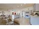 Open-concept kitchen with gray cabinets, granite counters, and stainless-steel appliances at 9814 W Menadota Dr, Peoria, AZ 85382