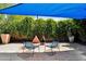 Outdoor living space featuring stylish seating and a unique fire pit at 1029 E Palo Verde Dr, Phoenix, AZ 85014