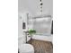 Modern bathroom with a tiled floor, unique vanity, and sleek shower at 1029 E Palo Verde Dr, Phoenix, AZ 85014