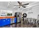 Open-concept kitchen with tiled floor, modern cabinets, and stainless steel appliances at 1029 E Palo Verde Dr, Phoenix, AZ 85014