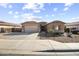 Charming single-story home featuring a well-maintained front yard and inviting curb appeal at 1101 W Oleander Ave, Queen Creek, AZ 85140