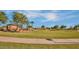 Enjoy the outdoors with this spacious green area with a covered picnic area perfect for community activities at 1101 W Oleander Ave, Queen Creek, AZ 85140
