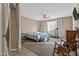 Spacious main bedroom with carpet floors, ceiling fan and window that brings in light at 1101 W Oleander Ave, Queen Creek, AZ 85140