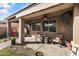 Covered patio with furniture and ceiling fan at 1101 W Oleander Ave, Queen Creek, AZ 85140