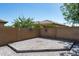 Outdoor patio with brick pavers and a privacy wall, ideal for entertaining or relaxation at 12546 N 142Nd Ln, Surprise, AZ 85379