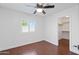 Bedroom with walk-in closet and plantation shutters at 12546 N 142Nd Ln, Surprise, AZ 85379