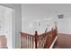 Second story hallway with wood flooring and railing at 12546 N 142Nd Ln, Surprise, AZ 85379