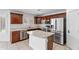Charming kitchen with stainless steel appliances, granite countertops and island at 12546 N 142Nd Ln, Surprise, AZ 85379