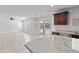 Light-filled living room featuring tile floors and seamless indoor-outdoor living at 12546 N 142Nd Ln, Surprise, AZ 85379