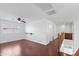 Upstairs loft featuring wood flooring and ceiling fan at 12546 N 142Nd Ln, Surprise, AZ 85379