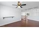Spacious loft area with hardwood flooring and natural light at 12546 N 142Nd Ln, Surprise, AZ 85379
