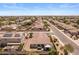This aerial view showcases the home's backyard with a gazebo and desert landscaping in the community at 1415 N Frederick Ln, Casa Grande, AZ 85122