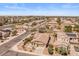 Expansive aerial view of a residential neighborhood, showcasing the layout and surrounding environment at 1415 N Frederick Ln, Casa Grande, AZ 85122