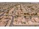 This aerial view showcases the home's lot location with desert landscaping in the neighborhood at 1415 N Frederick Ln, Casa Grande, AZ 85122