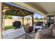Patio featuring grill, hot tub and lounge chairs at 1415 N Frederick Ln, Casa Grande, AZ 85122