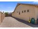 Gated side yard features a gravel ground cover for low maintenance at 1415 N Frederick Ln, Casa Grande, AZ 85122