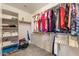 Organized walk-in closet with built-in shelving and ample storage space at 1415 N Frederick Ln, Casa Grande, AZ 85122