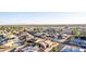 Expansive aerial perspective showing residential area nestled among desert landscape at 14821 N 62Nd Ave, Glendale, AZ 85306