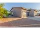 Spacious garage with an automatic door and extra room for cars at 14821 N 62Nd Ave, Glendale, AZ 85306