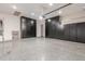 Spacious garage with epoxy flooring and extensive built-in storage cabinets for organized living at 14821 N 62Nd Ave, Glendale, AZ 85306