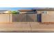 Modern gray home gate with unique geometric design offering privacy and curb appeal at 14821 N 62Nd Ave, Glendale, AZ 85306