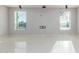 Spacious living area featuring tile floors and multiple windows for natural light at 14821 N 62Nd Ave, Glendale, AZ 85306