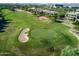 Expansive aerial view of a lush golf course with sand traps and manicured greens at 15240 N Clubgate Dr # 160, Scottsdale, AZ 85254