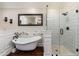 Elegant bathroom boasts a soaking tub, a glass shower, and upscale finishes at 15240 N Clubgate Dr # 160, Scottsdale, AZ 85254