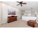 Spacious loft area with a large dresser, a comfortable couch, and plenty of natural light at 15240 N Clubgate Dr # 160, Scottsdale, AZ 85254
