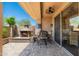 Enjoy outdoor living with a fireplace and an outdoor dining space accessible from the sliding glass door on the patio at 15240 N Clubgate Dr # 160, Scottsdale, AZ 85254