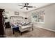 Comfortable bedroom with ceiling fan, and window that allows for natural light at 16219 W Yucatan Dr, Surprise, AZ 85379