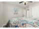 Bedroom showing patterned bedspread, recessed lights, and closet at 16219 W Yucatan Dr, Surprise, AZ 85379