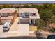Charming home featuring a neutral color palette, manicured landscaping, and an attached two-car garage at 17433 W Holland Ln, Surprise, AZ 85388