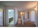 Upstairs hallway with carpeted floors, neutral walls, and easy access to rooms creates a cohesive flow at 17433 W Holland Ln, Surprise, AZ 85388