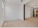 Spacious living room showcasing an open layout connecting to the kitchen at 18032 W Muirwood Dr, Goodyear, AZ 85338